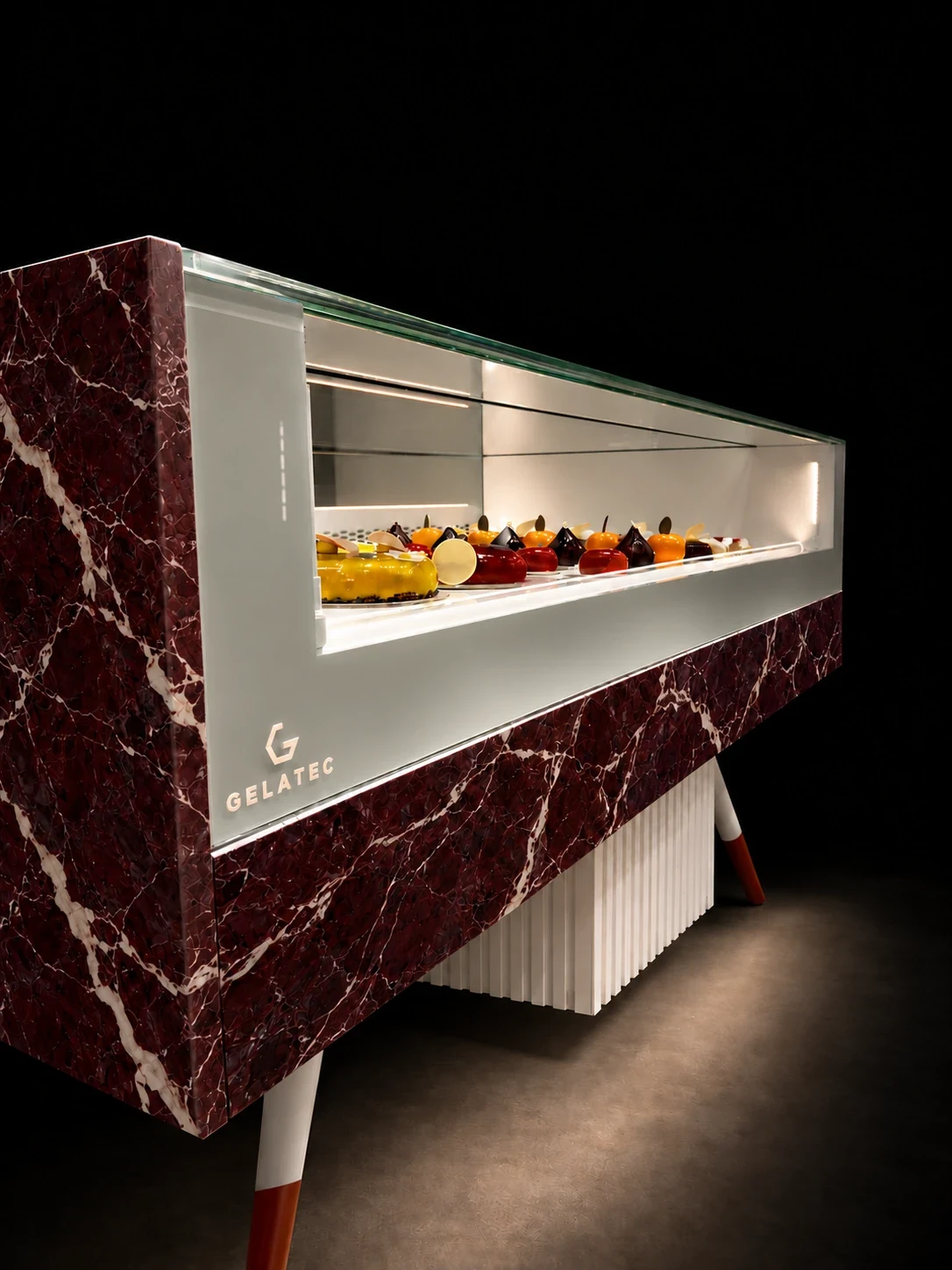 GELATEC MI pastry showcase with burgundy marble, clear glass and a white fluted base